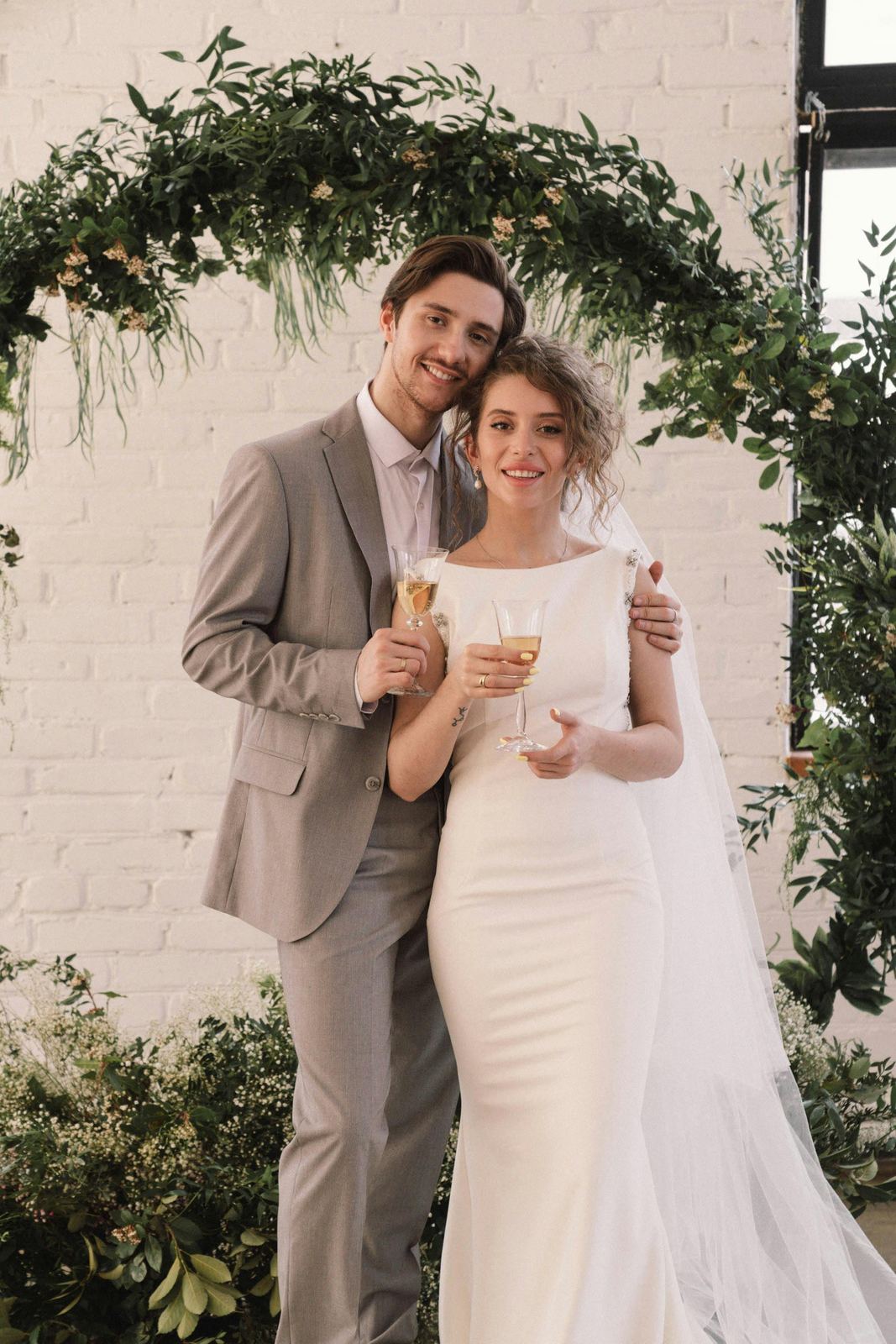 Engaged couple toasting with champagne